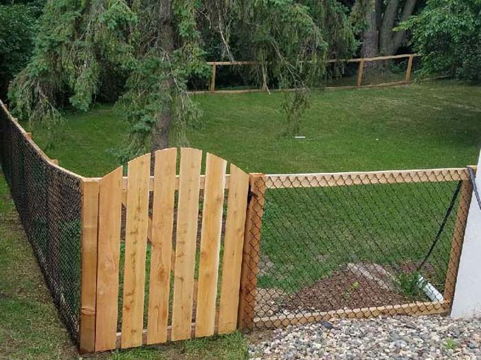 Photo of a wood and chain link dog fence in Minneapolis, MN